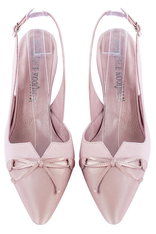 Light pink women's open back shoes, with a knot. Tapered toe. Medium comma heels. Top view - Florence KOOIJMAN